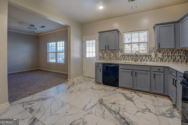 kitchen featuring black appliances, gray cabinetry, sink, ornamental molding, and backsplash