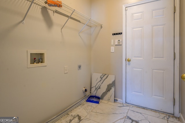 laundry area with washer hookup and electric dryer hookup