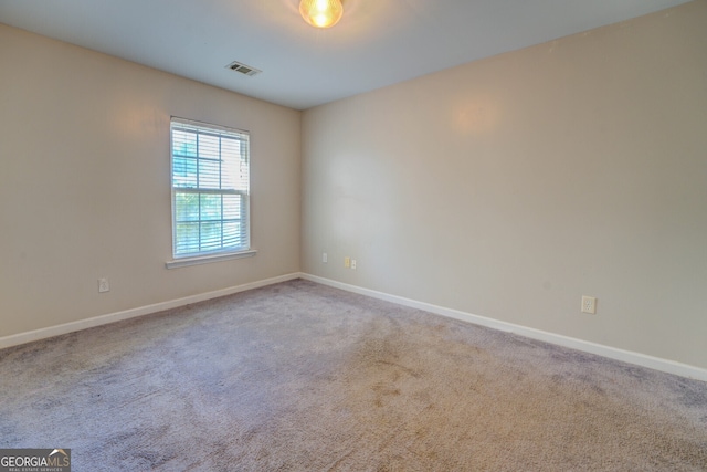 view of carpeted spare room