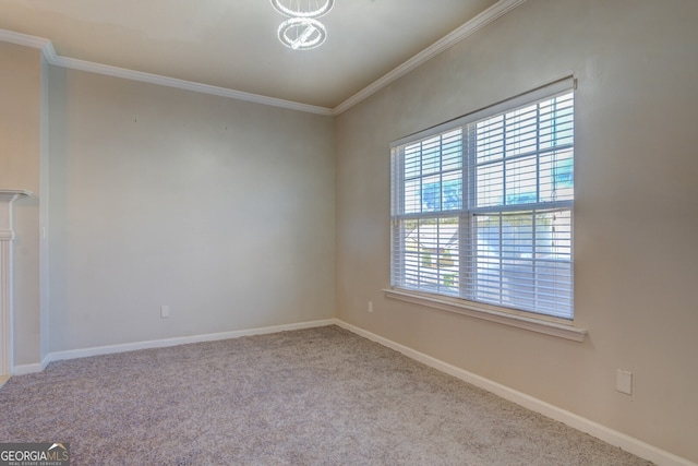 empty room featuring light colored carpet and crown molding