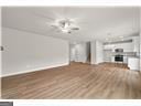 unfurnished living room with hardwood / wood-style flooring