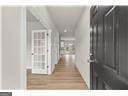 hallway featuring hardwood / wood-style floors