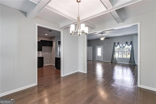 interior space with beamed ceiling, ceiling fan with notable chandelier, and dark hardwood / wood-style flooring