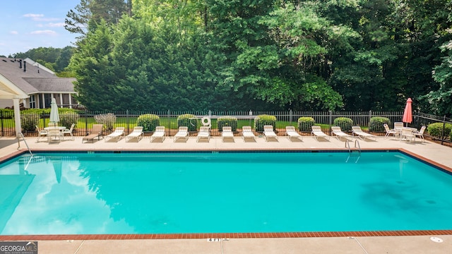 view of pool with a patio