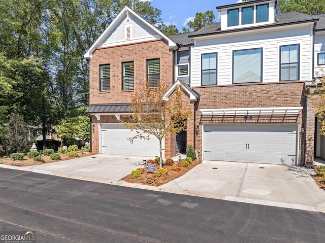 view of front of home with a garage