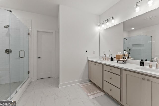 bathroom with vanity and an enclosed shower