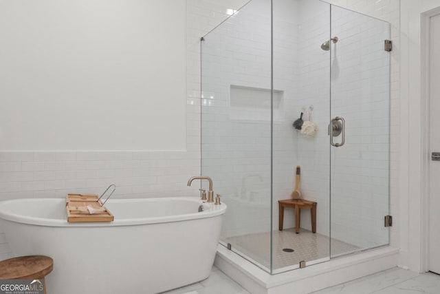 bathroom with independent shower and bath