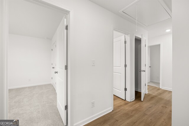 hallway featuring light hardwood / wood-style floors