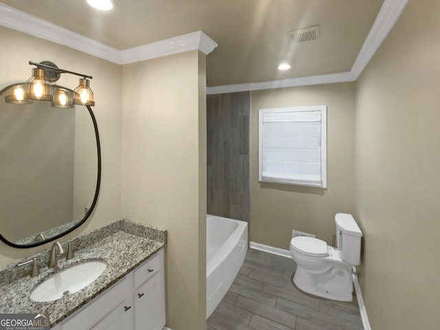 bathroom featuring crown molding, hardwood / wood-style flooring, vanity, and toilet