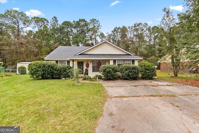 view of front of home with a front yard