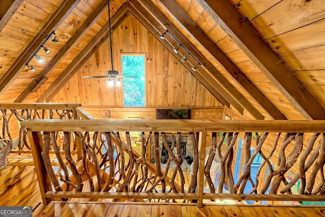 details featuring wooden ceiling, wooden walls, and beamed ceiling