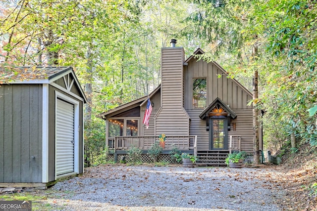 view of front of home with an outdoor structure and a garage