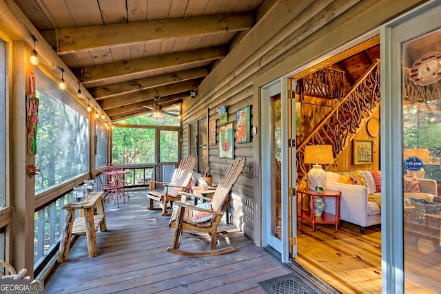 sunroom / solarium with wood ceiling and lofted ceiling with beams