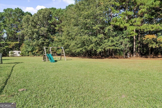 view of yard with a playground