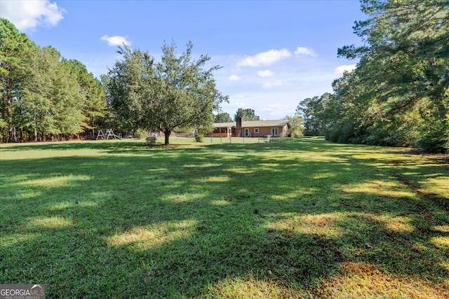 view of yard featuring a playground