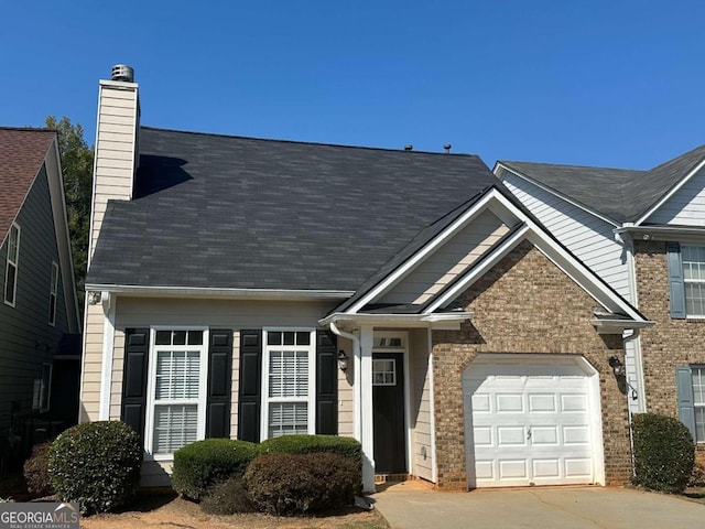 view of front of home with a garage