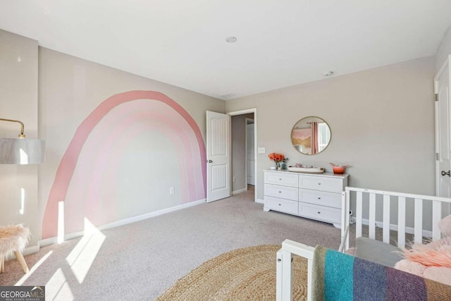 bedroom featuring light carpet