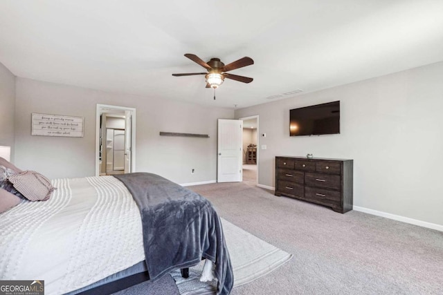 bedroom with ceiling fan and carpet