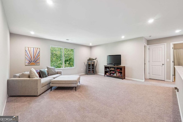 living room featuring light carpet