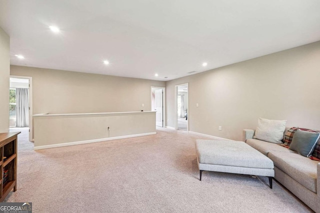 living room featuring light colored carpet