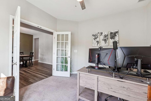 office space with french doors, dark wood-type flooring, and ceiling fan