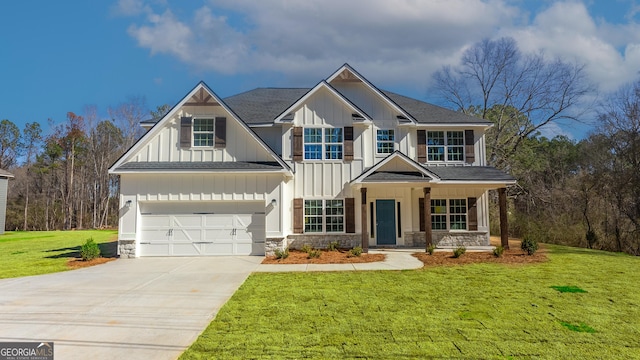 view of front facade featuring covered porch, a front yard, and a garage