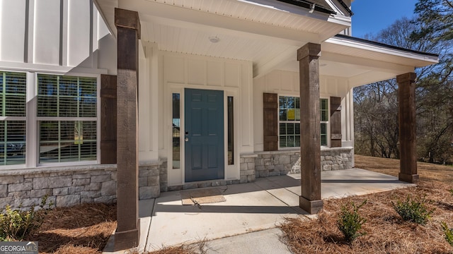 property entrance with a porch