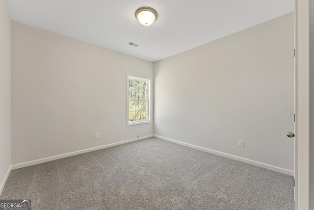 view of carpeted spare room