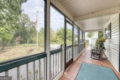 sunroom / solarium with wooden ceiling