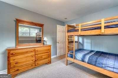 bedroom with light colored carpet