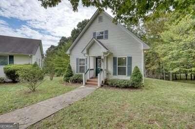 bungalow with a front lawn