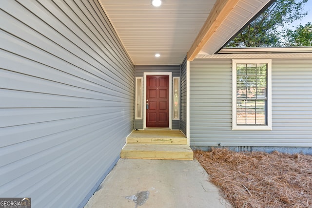 view of exterior entry with crawl space