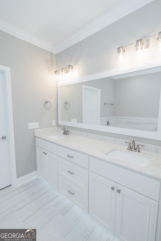 245 Ryan Nicholas Dr, Kingsland, GA 31548 - bathroom with crown molding, a sink, and double vanity