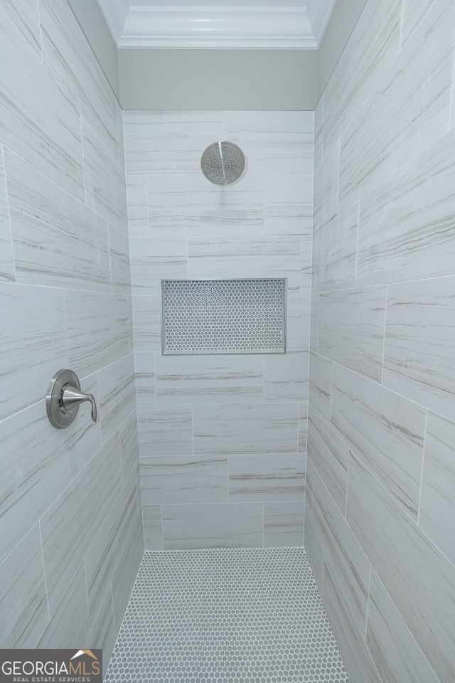 245 Ryan Nicholas Dr, Kingsland, GA 31548 - full bath with crown molding and a tile shower