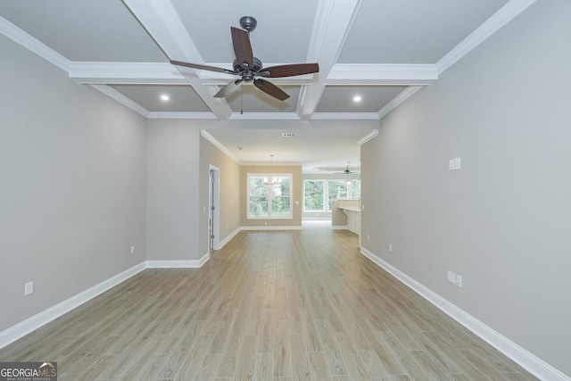 245 Ryan Nicholas Dr, Kingsland, GA 31548 - unfurnished living room with crown molding, ceiling fan, beamed ceiling, and light wood-type flooring