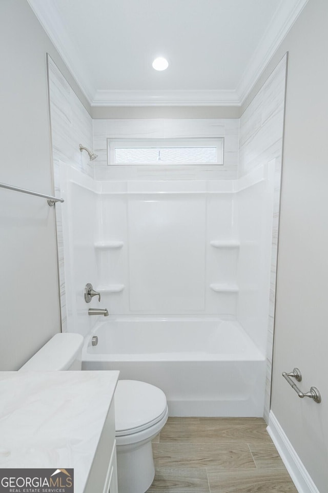 245 Ryan Nicholas Dr, Kingsland, GA 31548 - bathroom with plenty of natural light, ornamental molding, and toilet