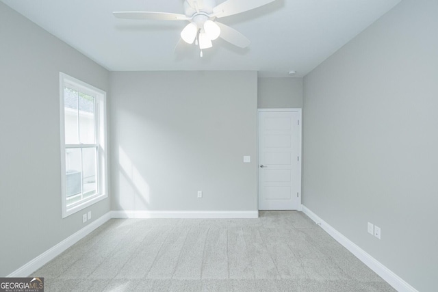 245 Ryan Nicholas Dr, Kingsland, GA 31548 - carpeted empty room featuring baseboards and a ceiling fan