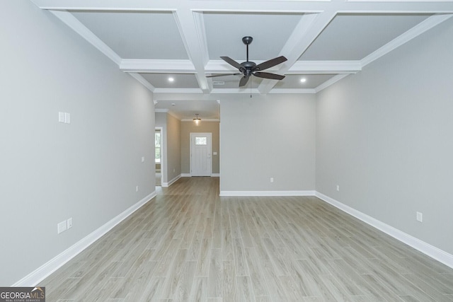245 Ryan Nicholas Dr, Kingsland, GA 31548 - interior space with ceiling fan, beam ceiling, light wood-style floors, baseboards, and coffered ceiling