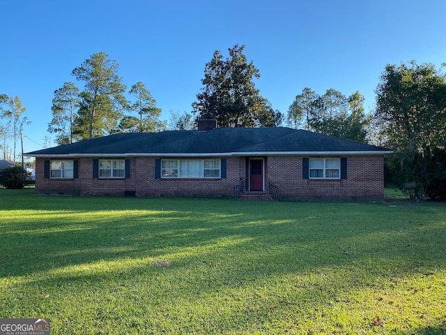 ranch-style home with a front lawn