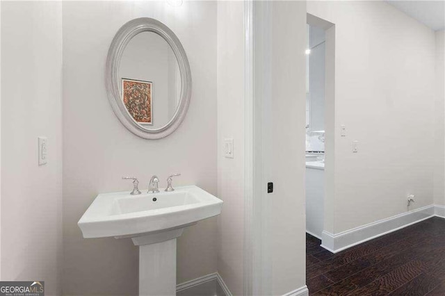 bathroom featuring hardwood / wood-style flooring