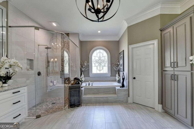 bathroom featuring vanity, ornamental molding, separate shower and tub, and a notable chandelier