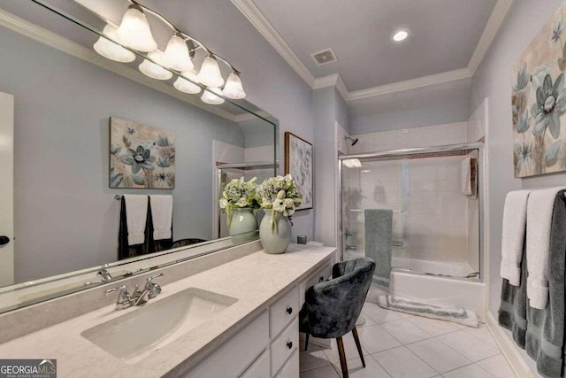 bathroom featuring shower / bath combination with glass door, vanity, ornamental molding, and tile patterned floors