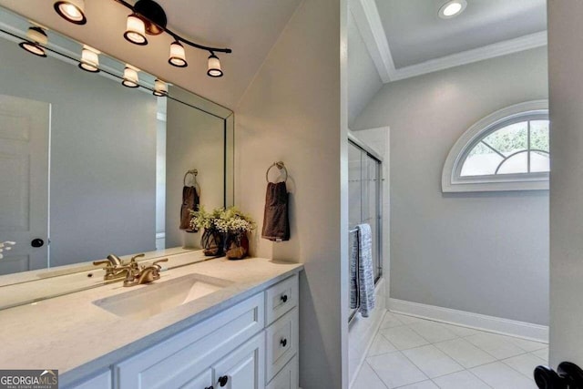 bathroom featuring shower / bath combination with glass door, vanity, ornamental molding, and tile patterned floors