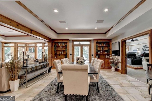 dining space featuring french doors, ornamental molding, and ceiling fan