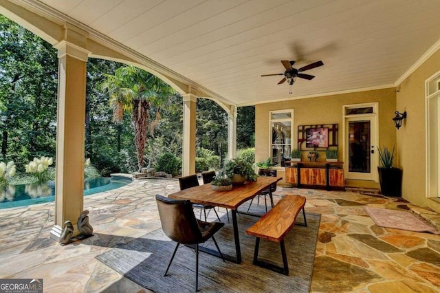 view of patio featuring ceiling fan