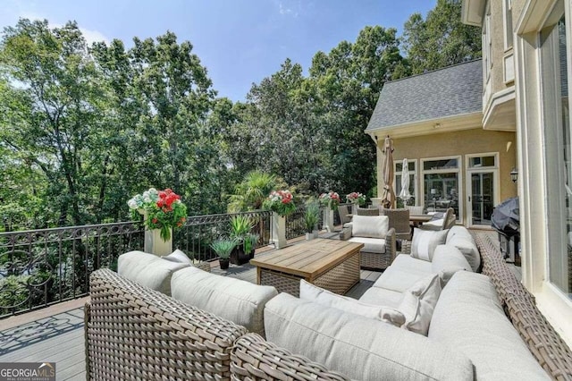 view of patio / terrace featuring outdoor lounge area and a wooden deck