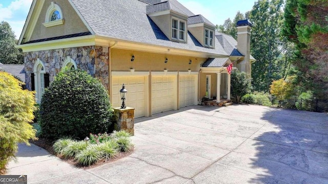 view of property exterior featuring a garage