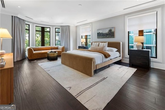 bedroom featuring dark hardwood / wood-style flooring