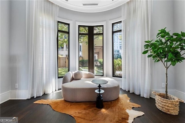 living area featuring dark hardwood / wood-style flooring