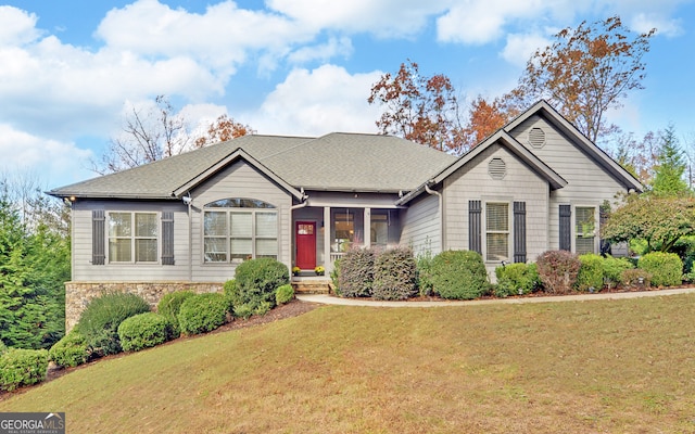 view of front of home with a front yard